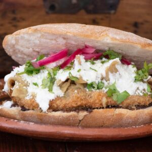 Chilaquiles Torta with Breaded Chicken Breast